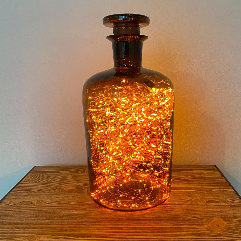 VINTAGE APOTHEKERFLASCHE MIT LICHTERKETTE - DAS_OBJEKT (7473381933269)